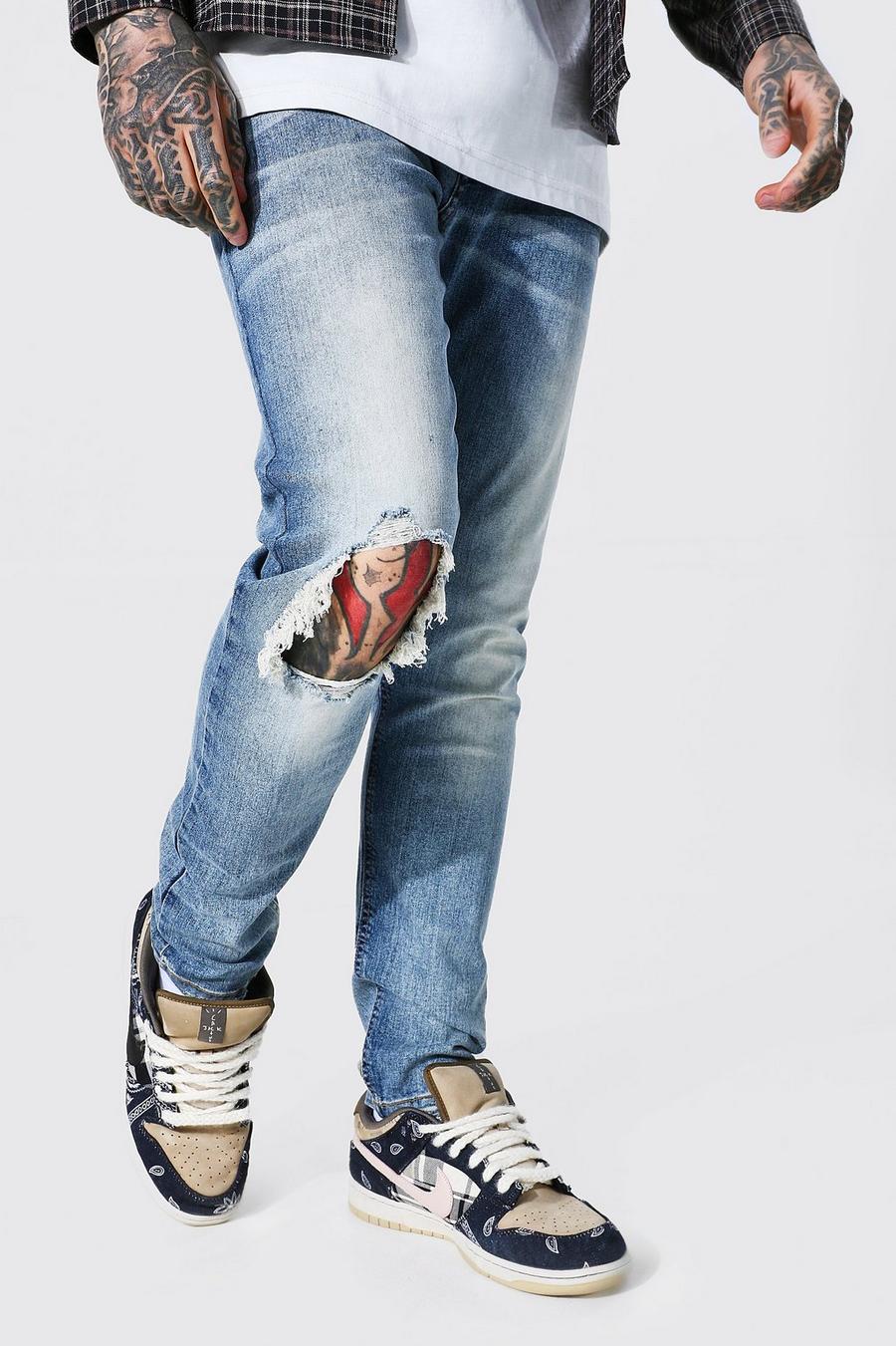 Light blue Skinny jeans med slitet knä image number 1