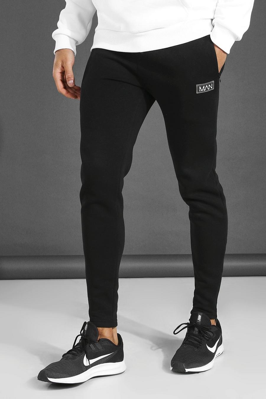 שחור מכנסי ריצה ספורטיביים לאימונים עם כיתוב Man image number 1