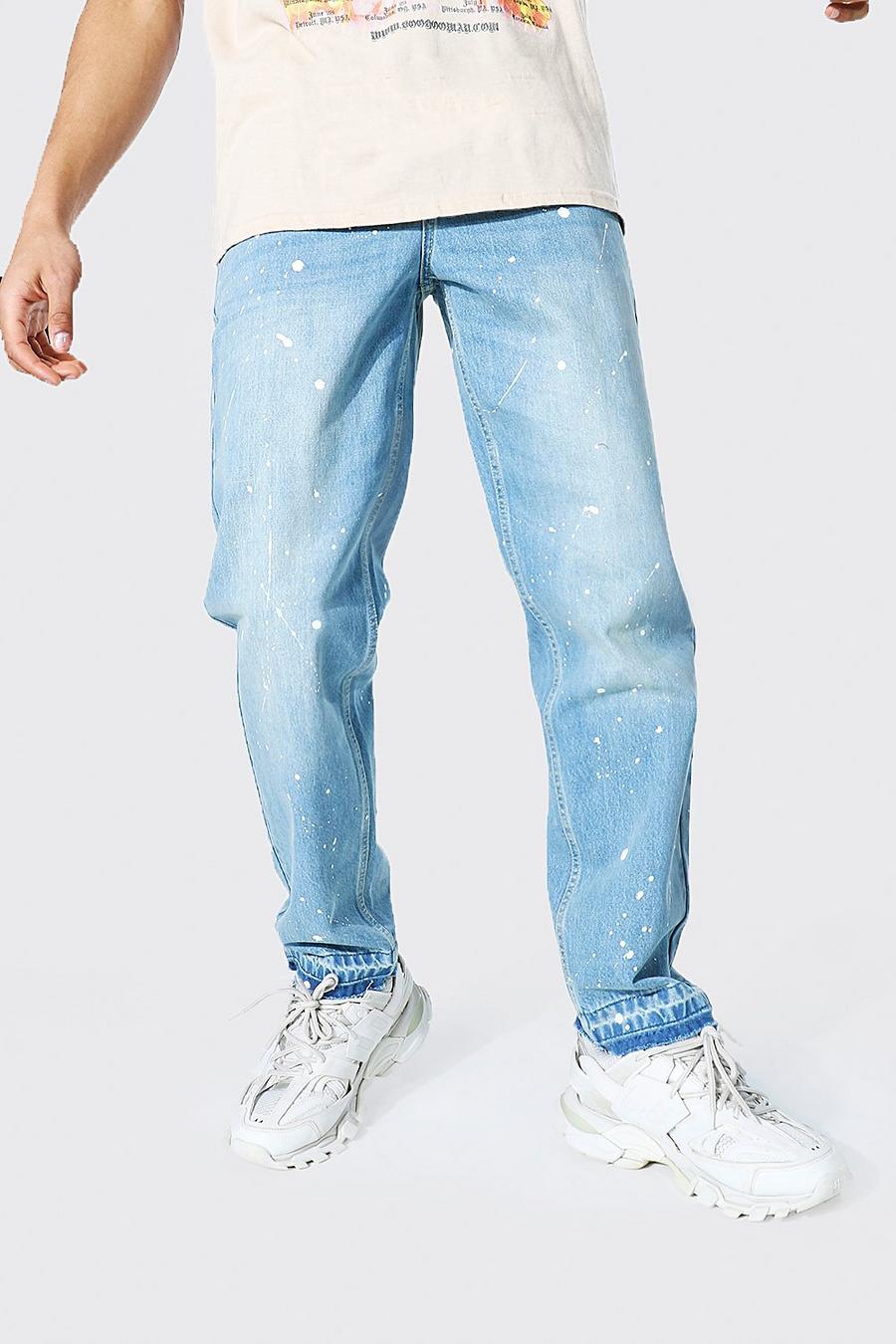 Ice blue Jeans med ledig passform, färgstänk och rå kant image number 1