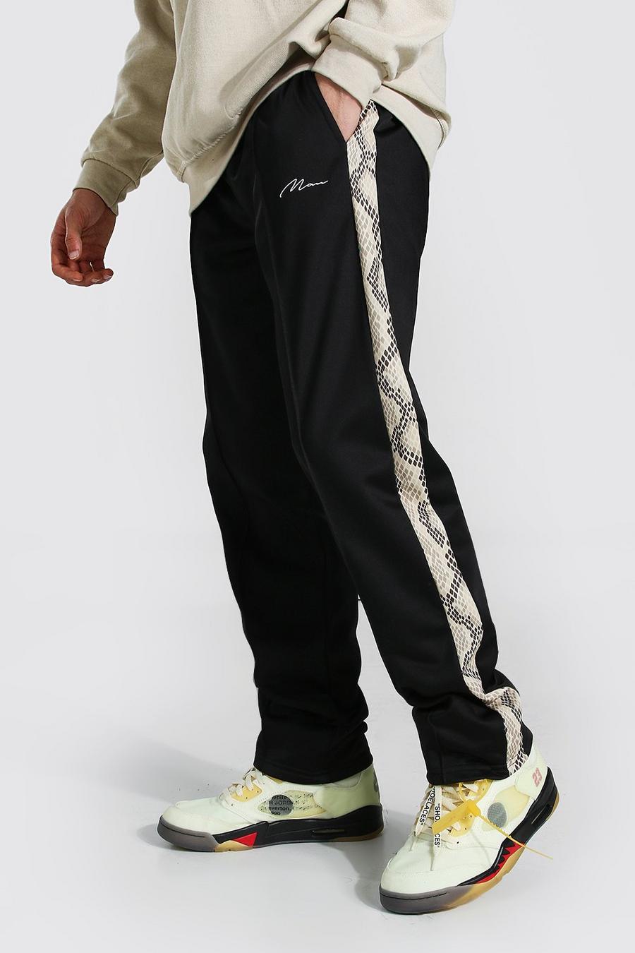 Pantaloni tuta in tricot taglio ampio con firma MAN e banda effetto pelle di serpente, Nero image number 1