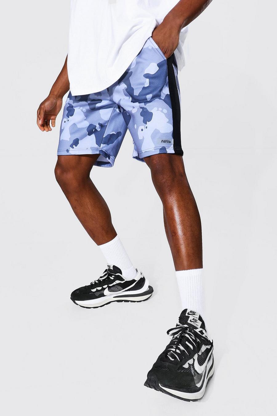 MAN Regular-Fit Jersey-Shorts mit Einsätzen in Camouflage-Print image number 1