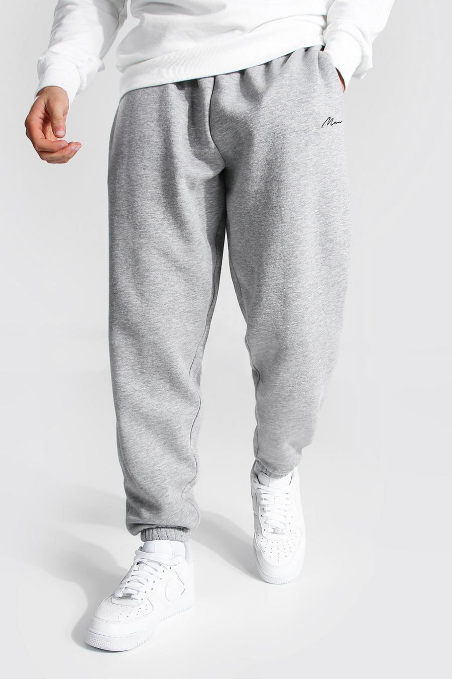 Pantaloni tuta taglio comodo con scritta Man, Grey marl image number 1