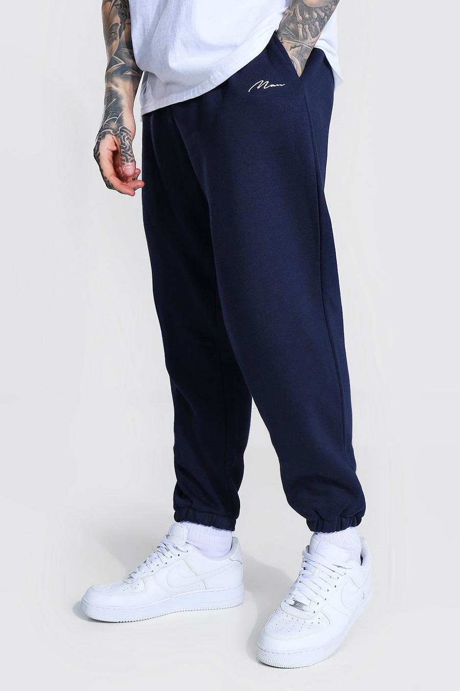 Pantaloni tuta taglio comodo con scritta Man, Navy image number 1