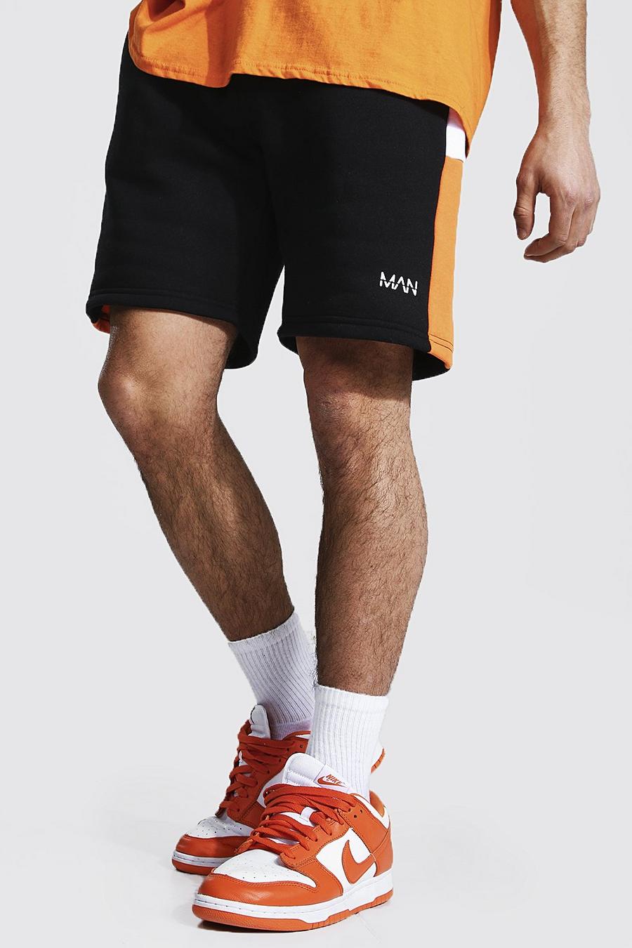 Pantaloncini regular in jersey a blocchi di colore con scritta MAN, Arancio image number 1