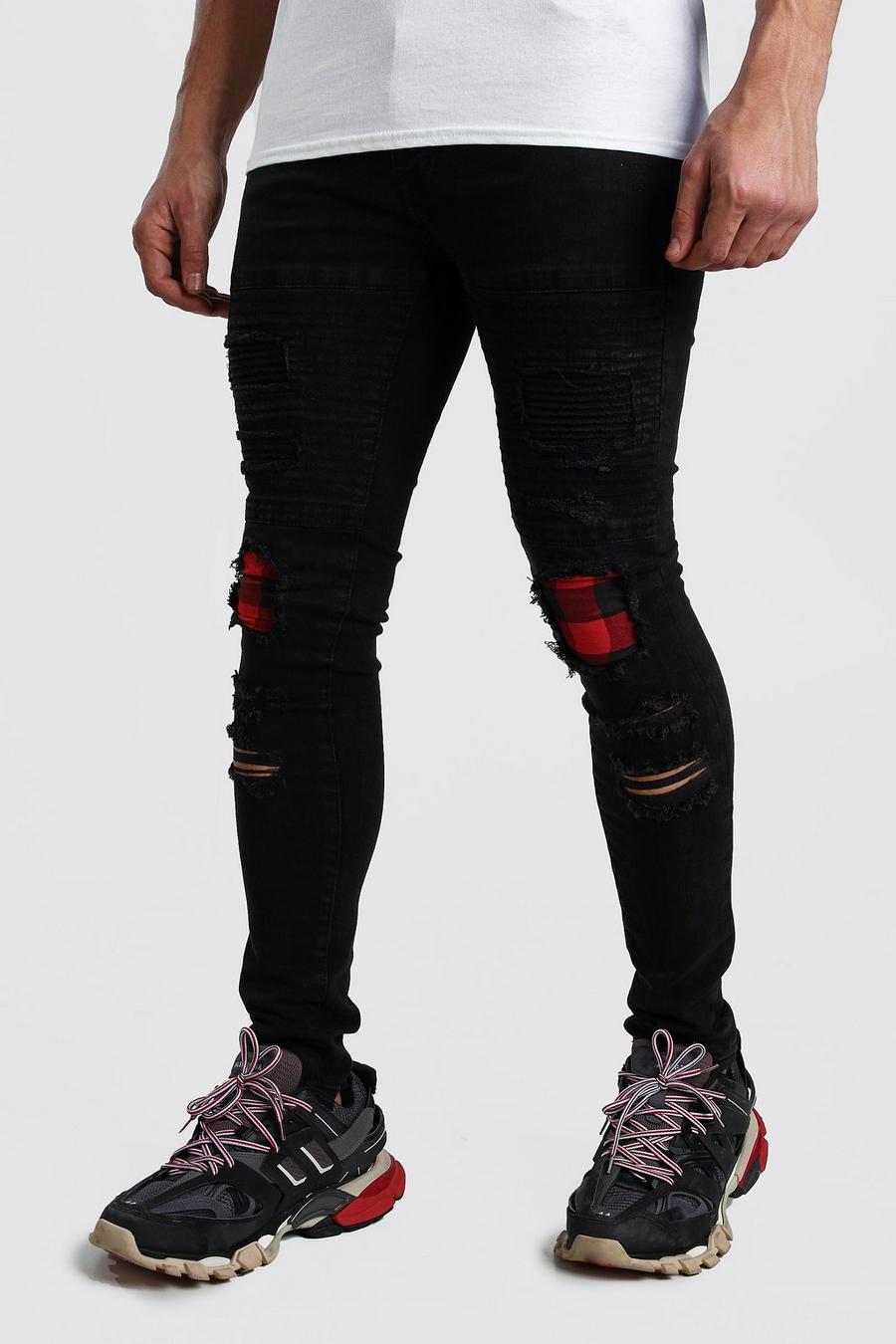 Slitna biker jeans med lagade hål image number 1