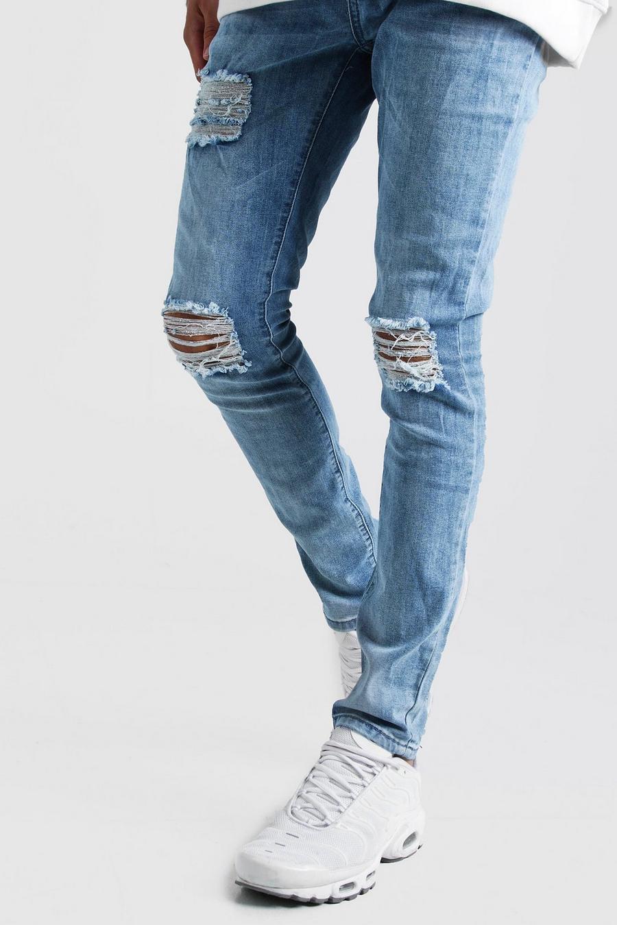 כחול משופשף סופר סקיני ג'ינס עם קרעים image number 1