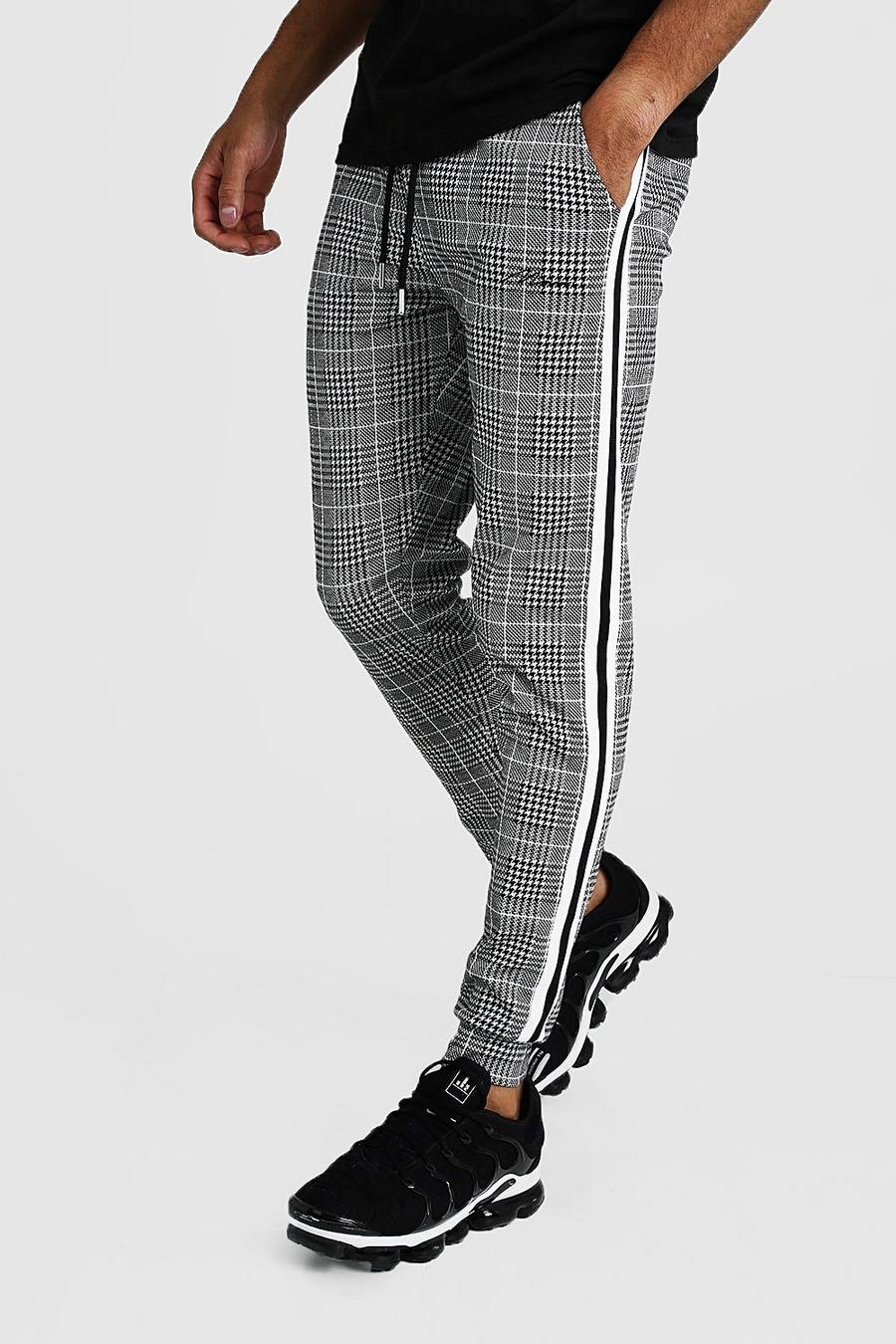 Pantalón deportivo de jacquard con firma MAN y botamanga con línea lateral, Gris image number 1