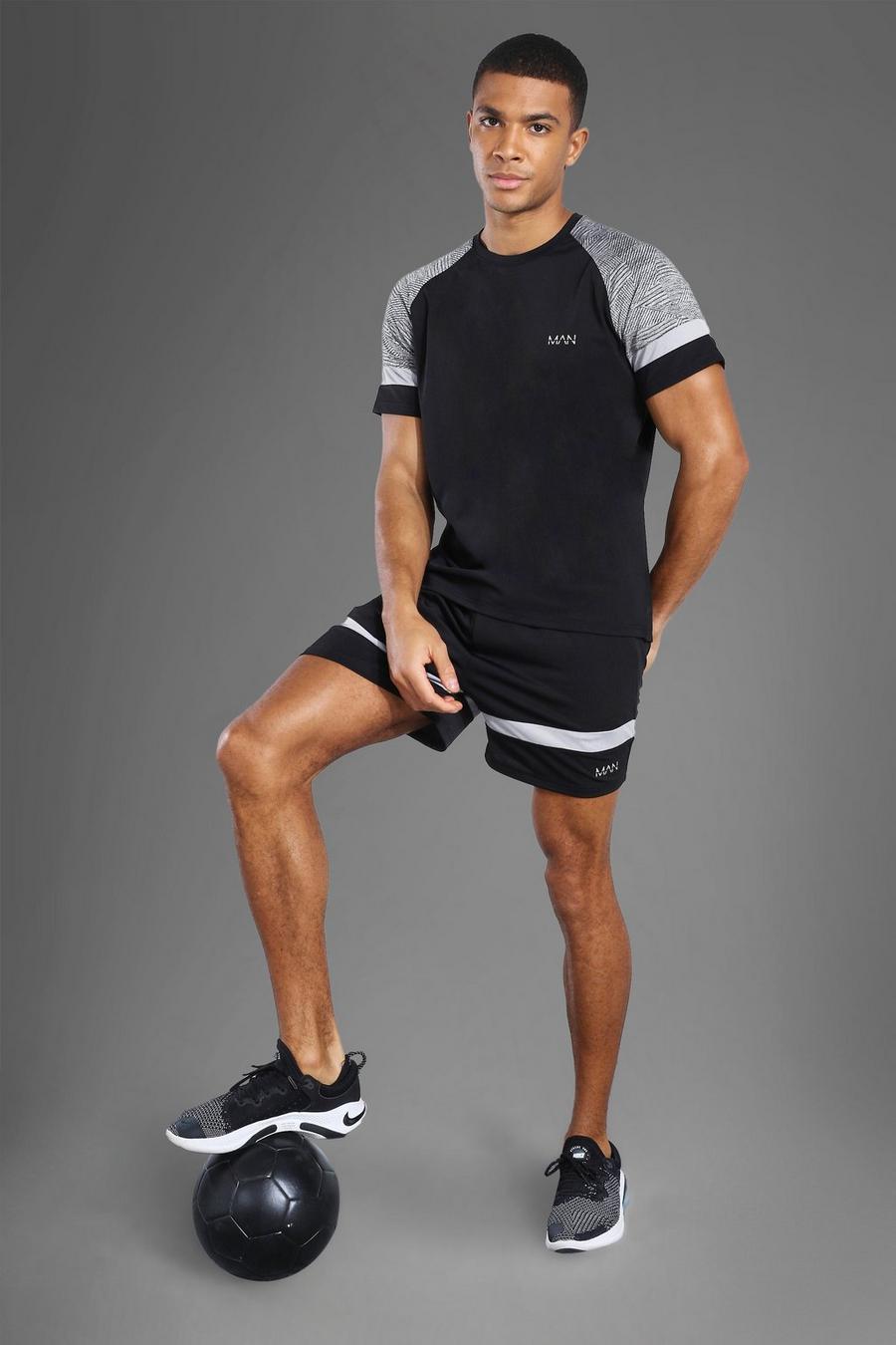 Black MAN Active T-shirt och shorts med paneler och fickor image number 1