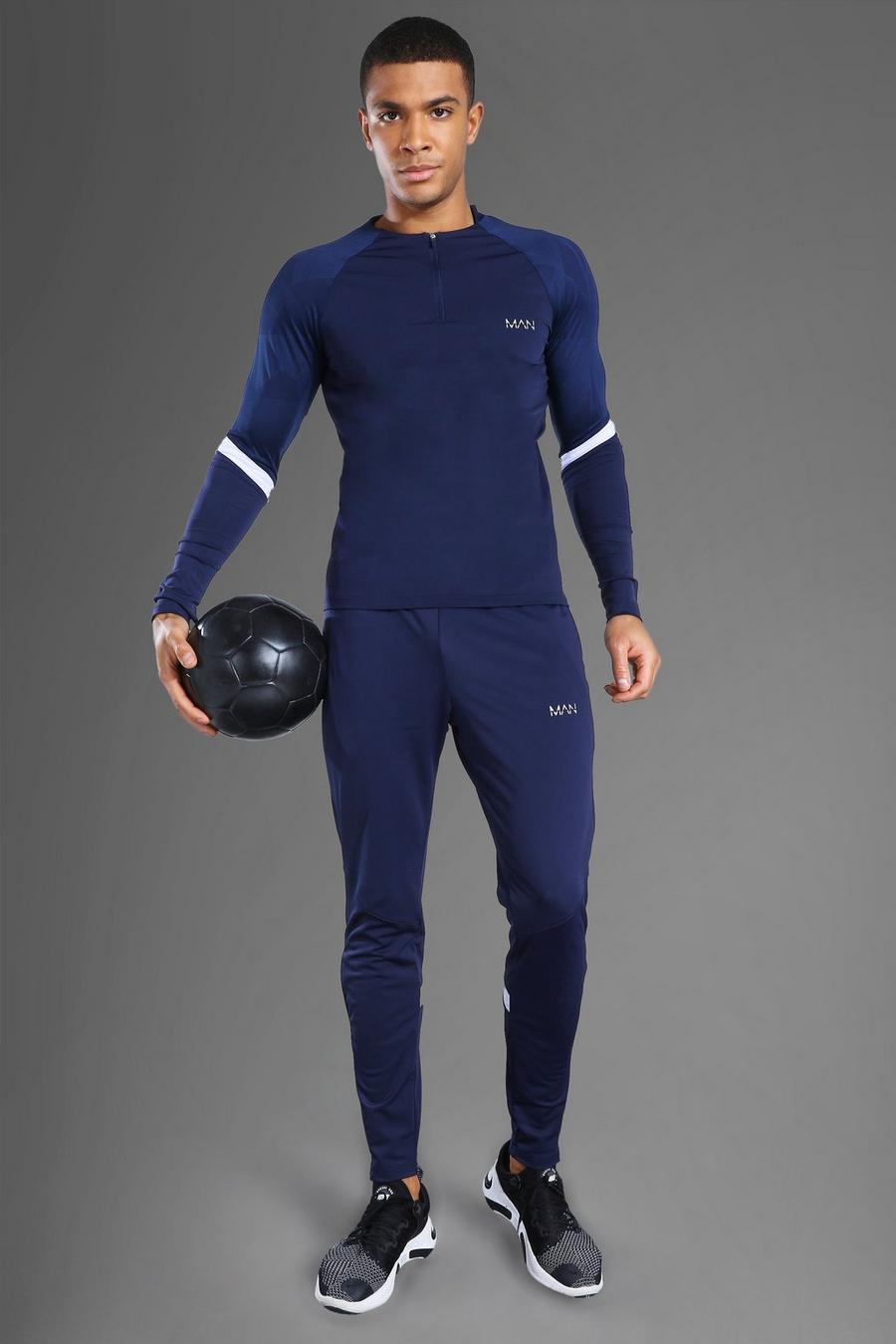 נייבי חליפת טרנינג ספורטיבית בגזרה צמודה עם רוכסן בצווארון עגול וכיתוב Man image number 1