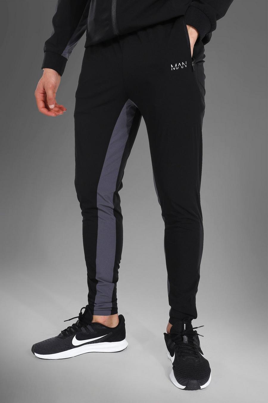 שחור מכנסי ריצה ספורטיביים ארוגים עם כיתוב Man image number 1