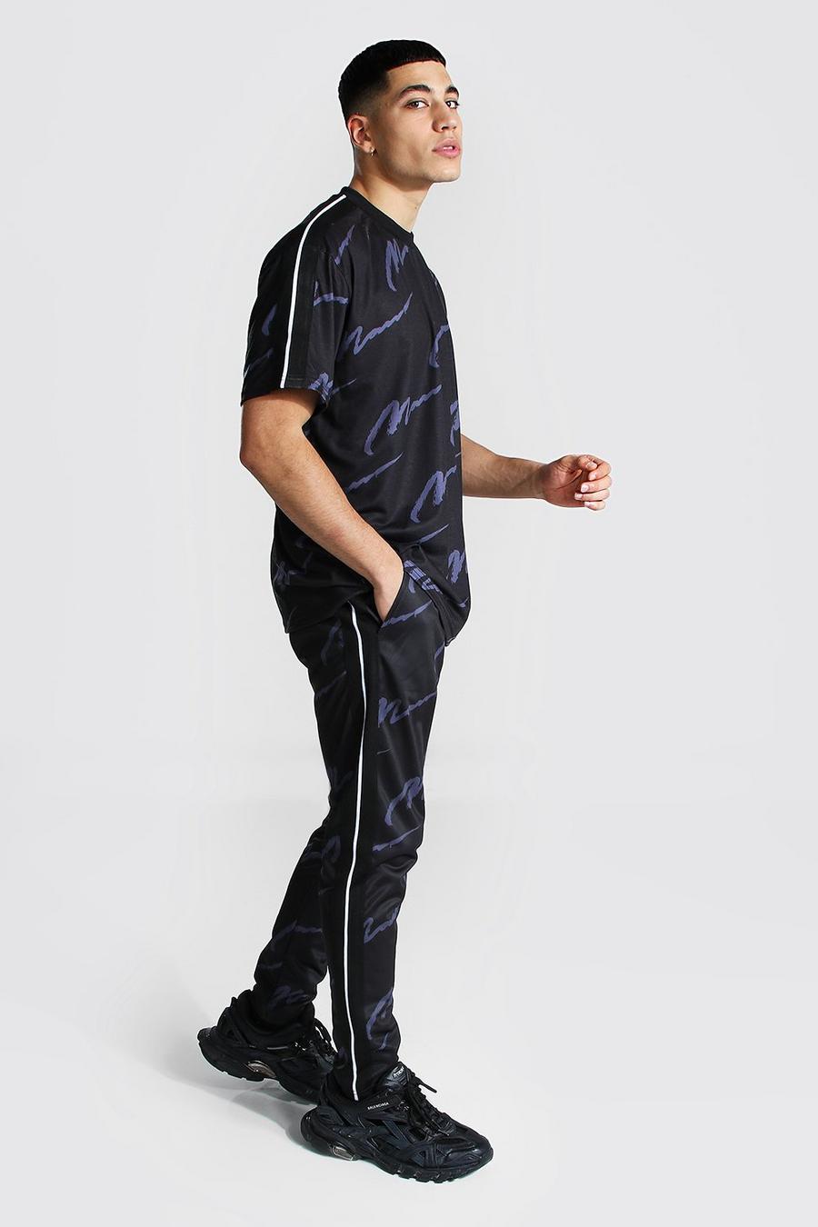 Übergroßes Set aus T-Shirt mit durchgehendem MAN-Print und Trikot-Jogginghosen, Schwarz image number 1