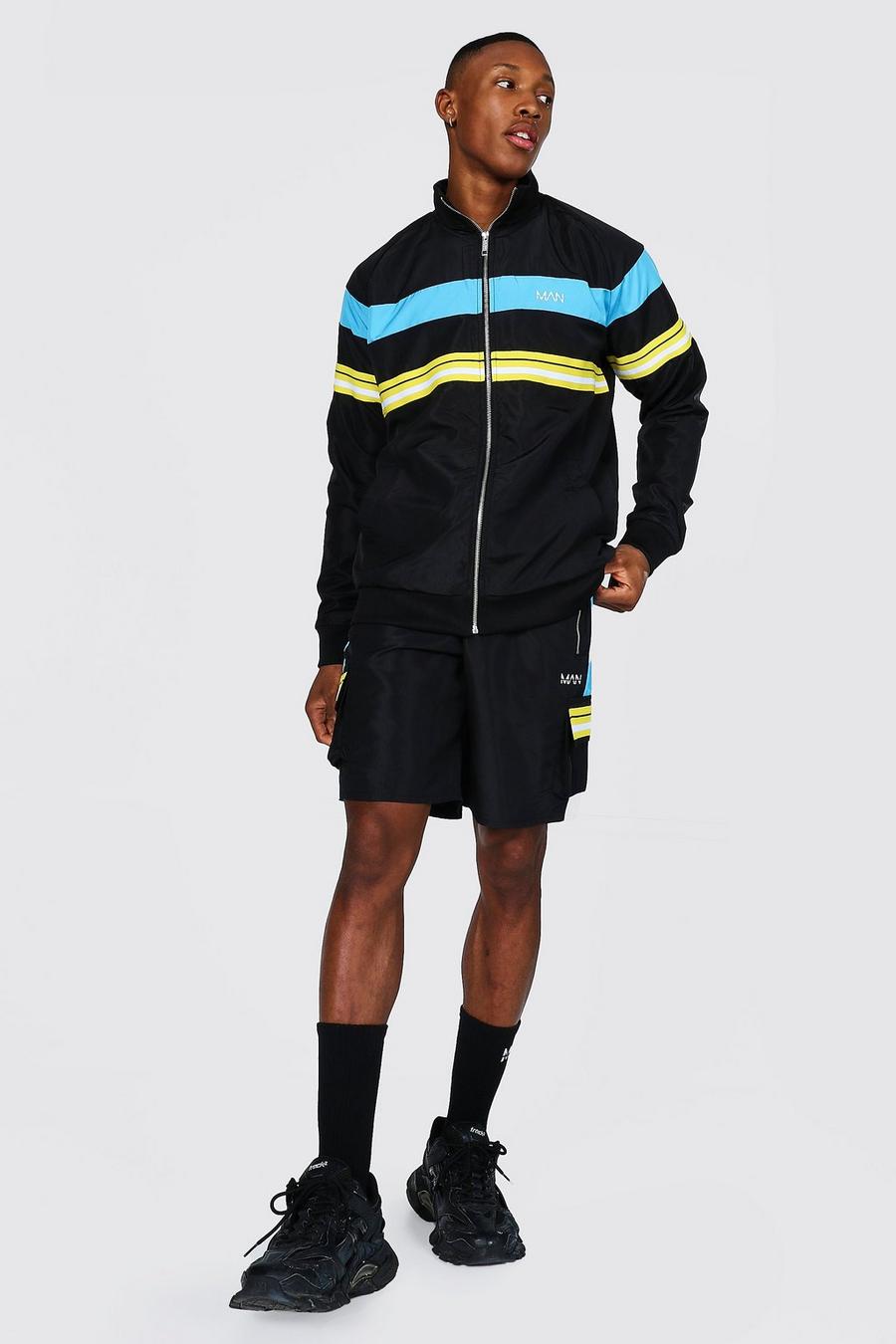 Black MAN Träningsoverall i skalmaterial med shorts och kantband image number 1