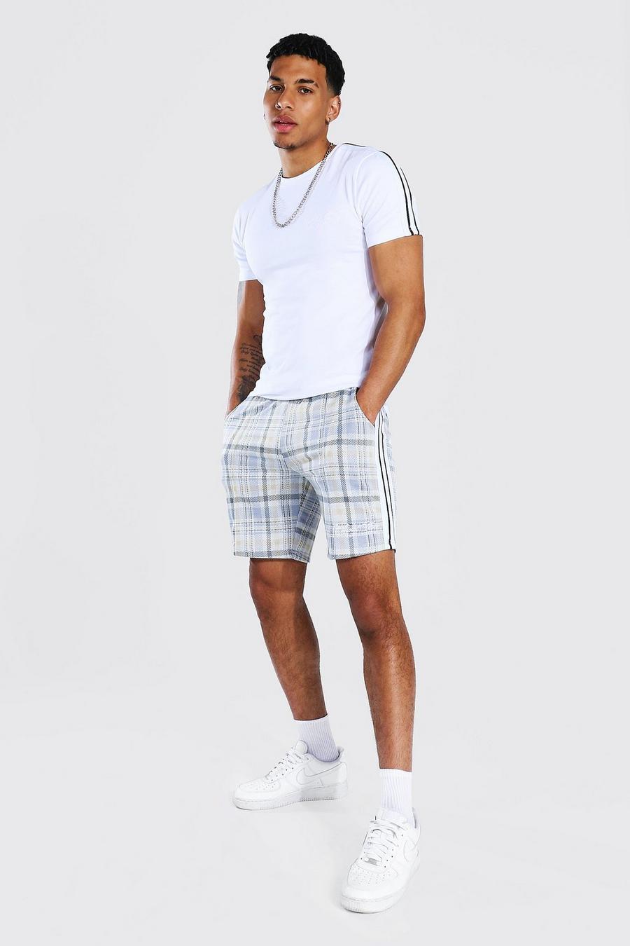 Muscle Fit Set aus T-Shirt mit Man-Streifen und Jacquard-Shorts, Blau image number 1