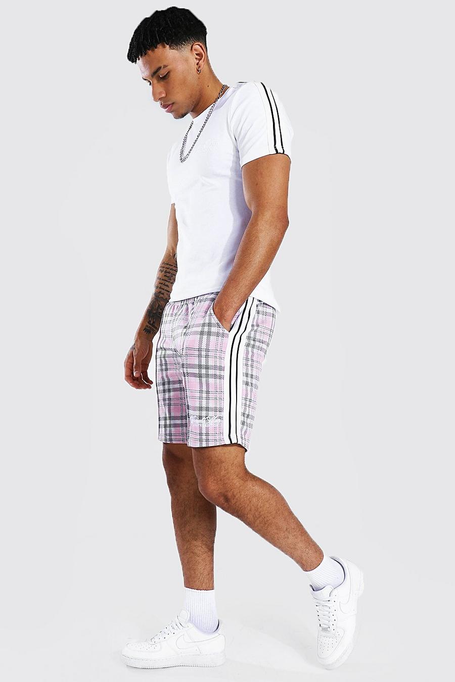 Set Man con pantaloncini in jacquard e t-shirt sagomata con fascia, Rosa image number 1