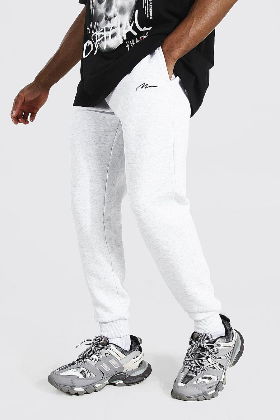 Pantalones de deporte de pitillo con el distintivo de la marca MAN, Gris ceniza image number 1