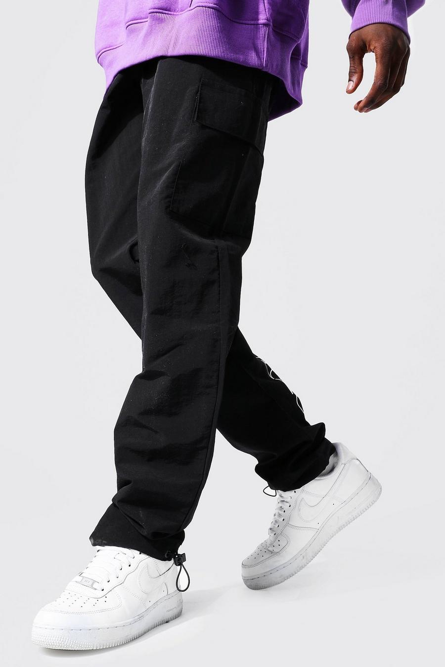Pantalones con bolsillos de conchas con cordón elástico Ofcl, Negro image number 1