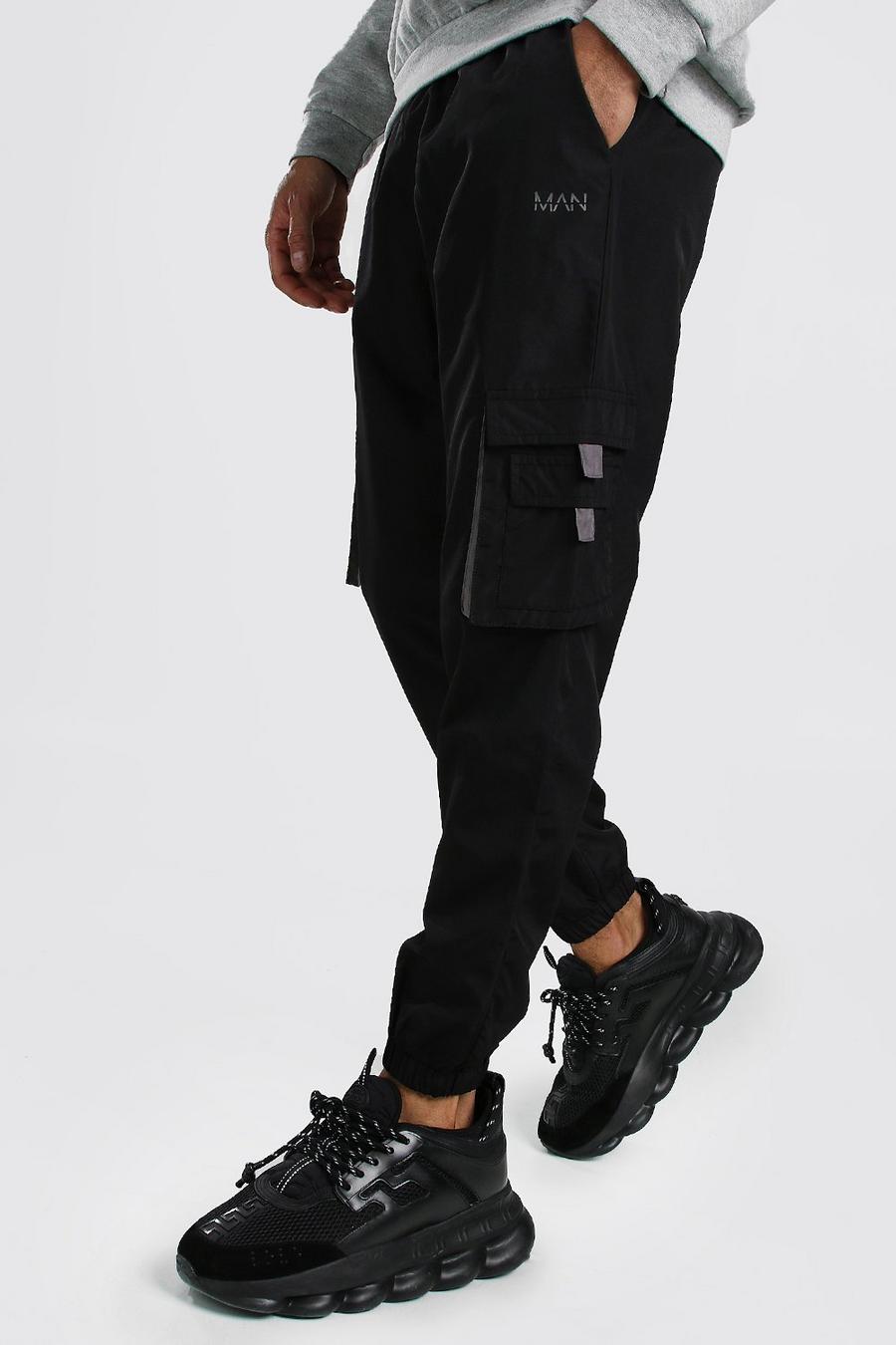 שחור מכנסי ריצה דגמ"ח מעטפת עם כיתוב Original MAN ותוויות image number 1