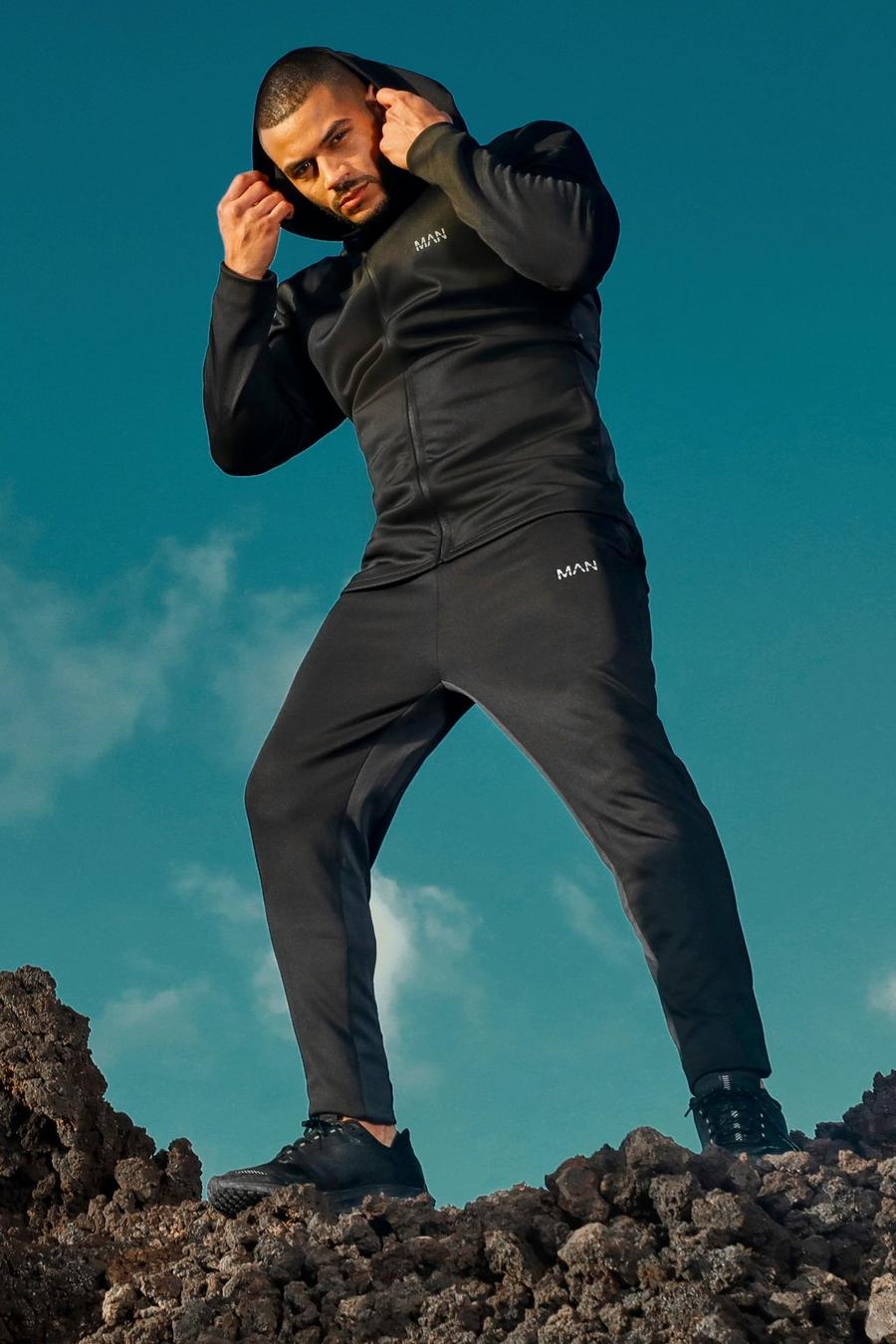 שחור חליפת טרנינג סקיני לאימונים עם פאנלים וכיתוב MAN image number 1
