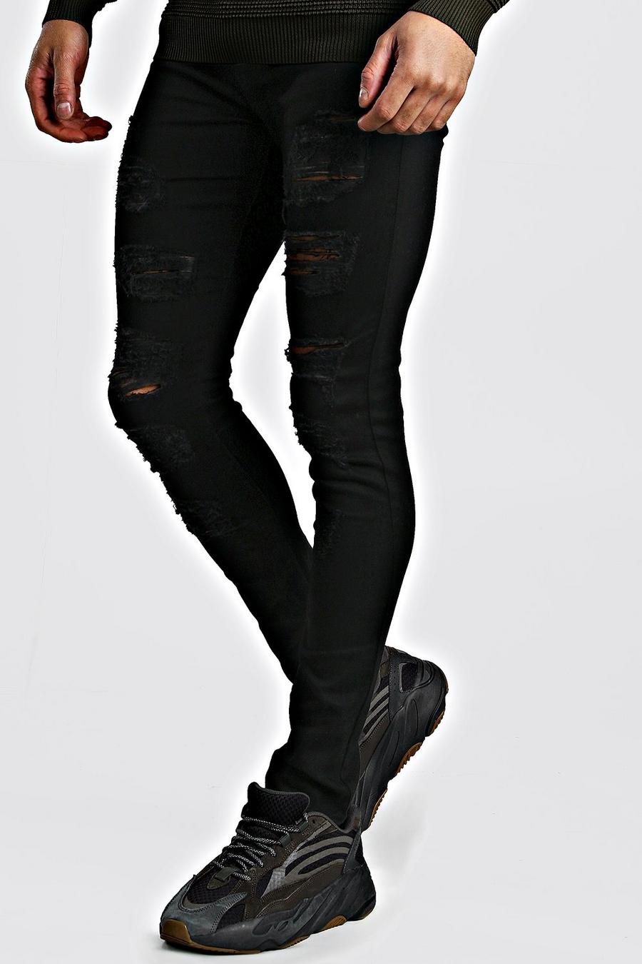 Black Super skinny jeans med mycket slitna detaljer image number 1