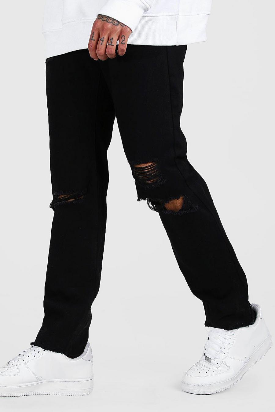 jeans con strappi e vestibilità slim image number 1