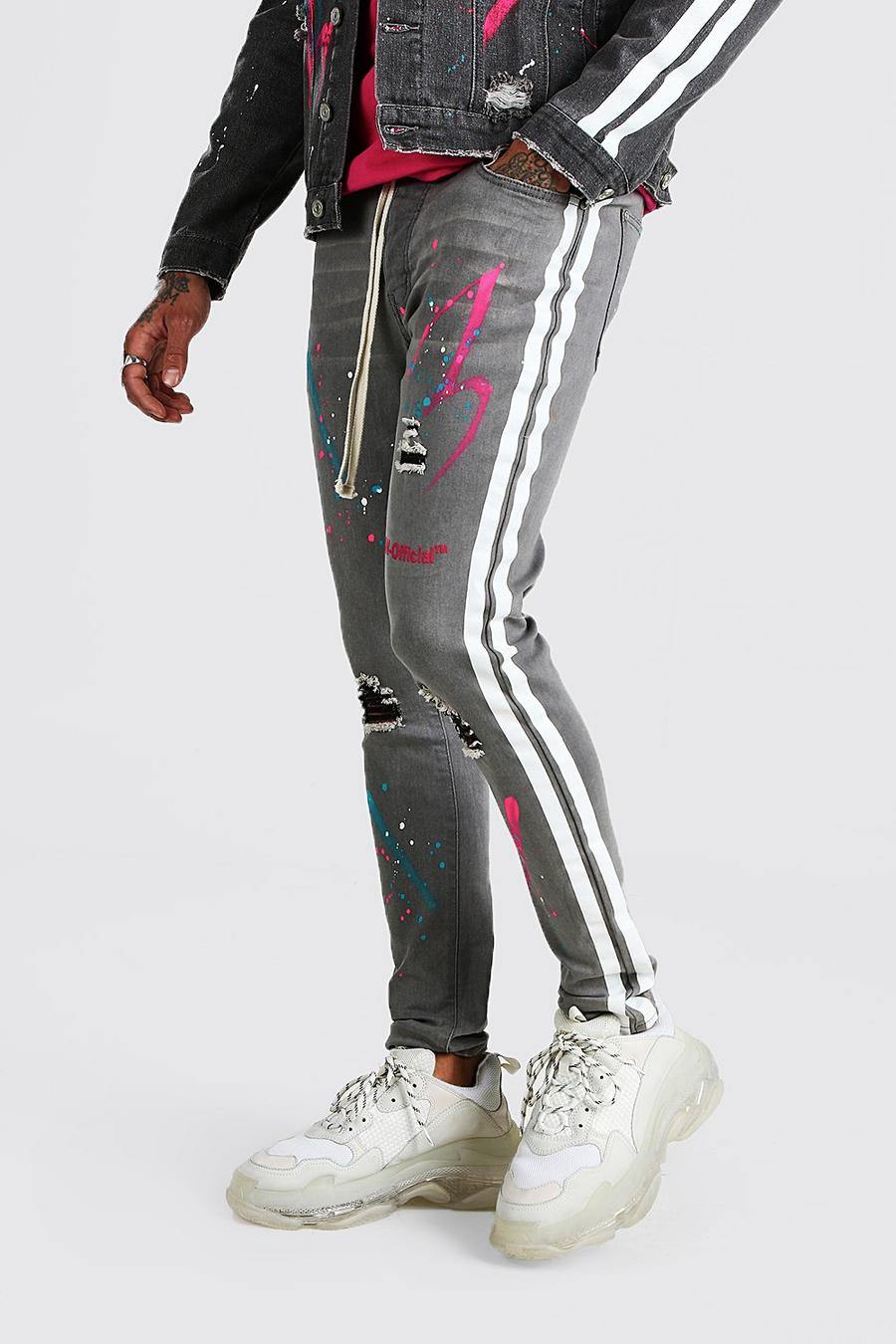Jeans skinny coordinati con scritta MAN Official con dettaglio in vernice image number 1