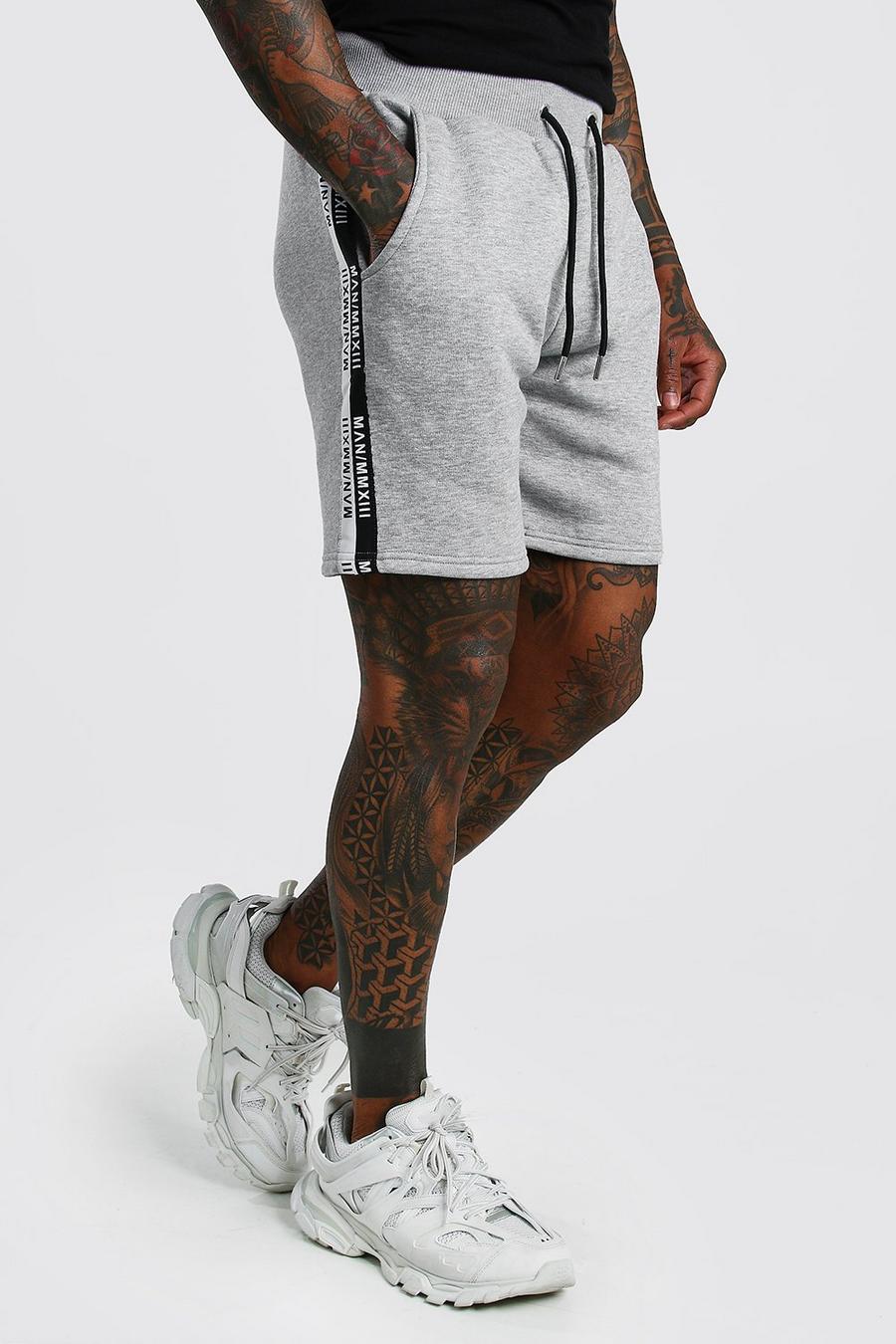 Grey marl MAN Mellanlånga shorts i jersey med kantband image number 1