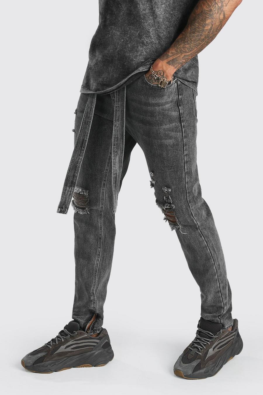 Skinny jeans i rigid denim med slitna detaljer och bälte image number 1