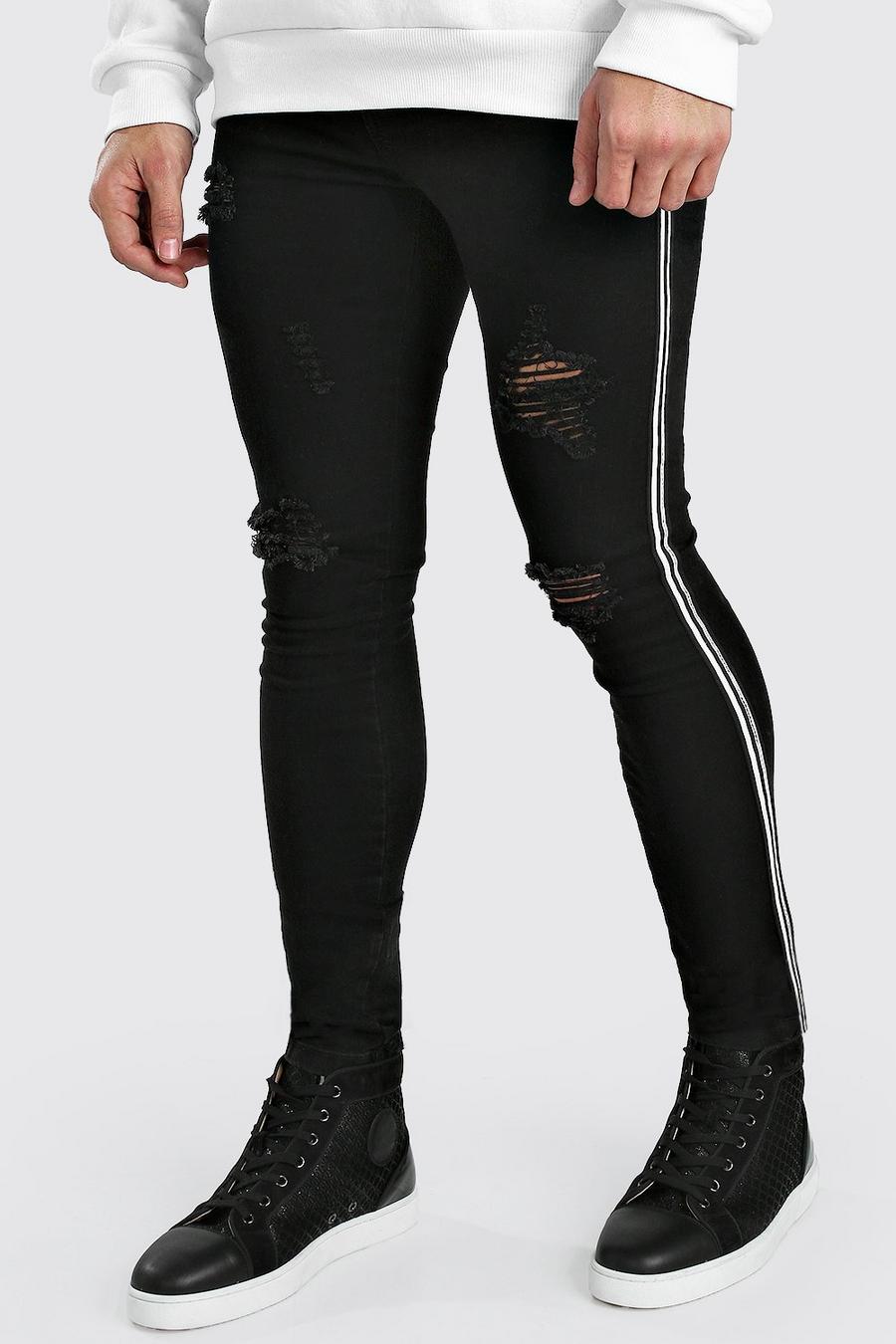 Washed black Super skinny jeans med slitna detaljer och kantband image number 1