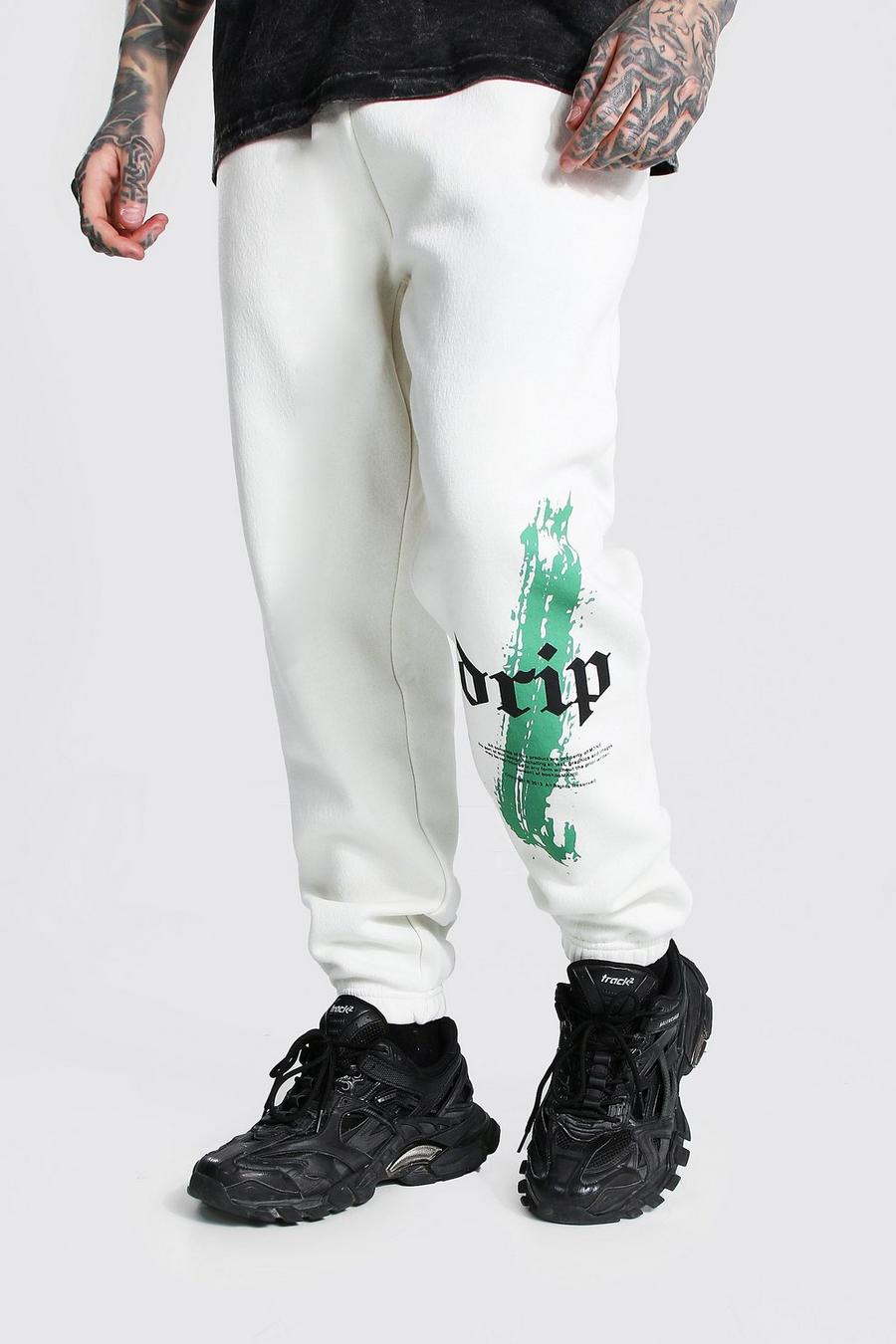 Pantaloni tuta regular con stampa effetto sgocciolante sulla gamba, Écru image number 1