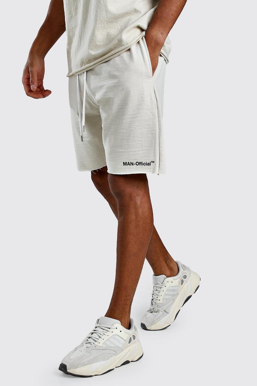 Ecru MAN Official Shorts med rå kant och ledig passform image number 1