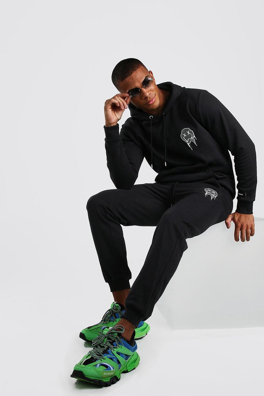 Black Official MAN Drip Face Hooded Tracksuit With Print image number 1