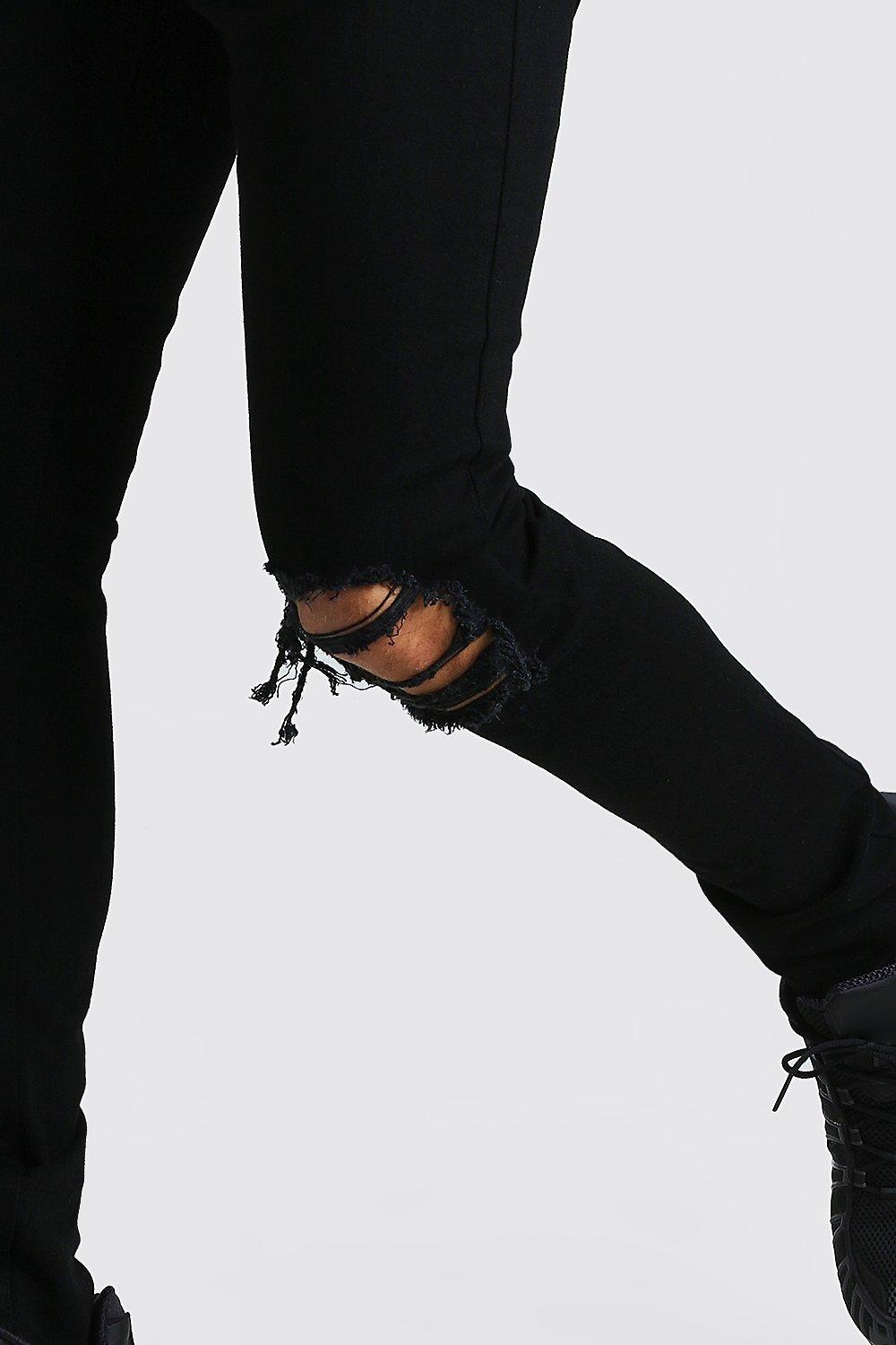 black busted knee skinny jeans