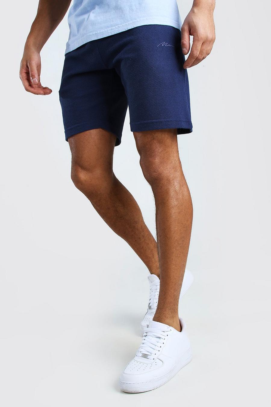 Mittellange Shorts aus Piqué mit MAN-Schriftzug image number 1