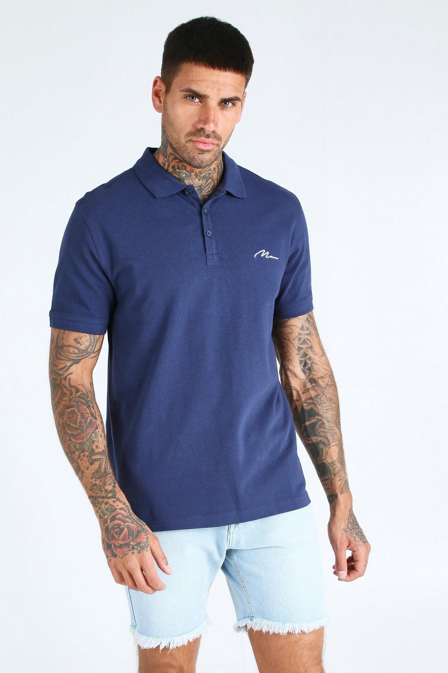 Kurzärmeliges Pique-Poloshirt mit MAN-Schriftzug, Marineblau image number 1