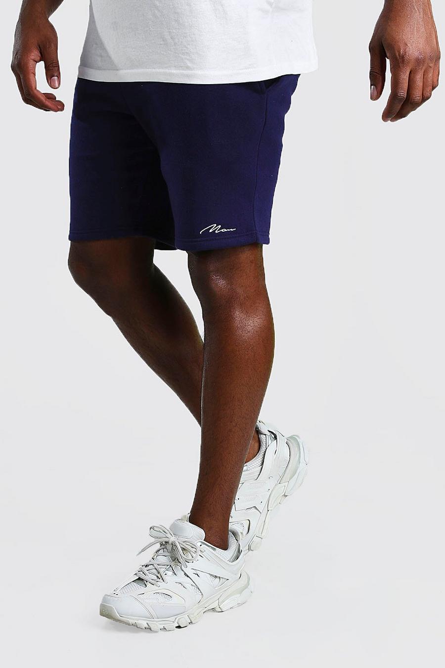 Pantaloncini in jersey di media lunghezza con scritta MAN image number 1