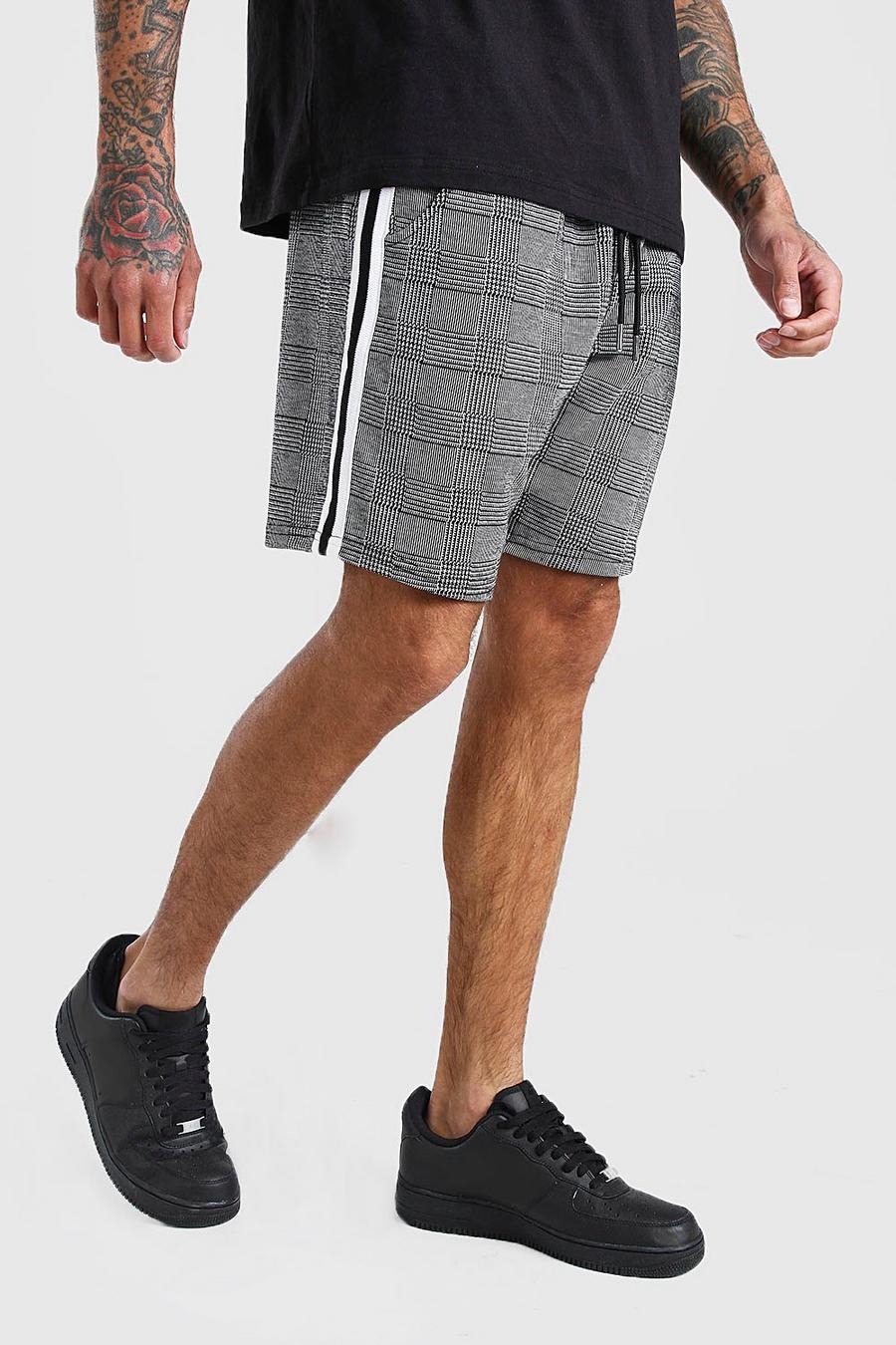 Pantaloncini MAN di media lunghezza in jacquard a quadri con nastro, Nero image number 1
