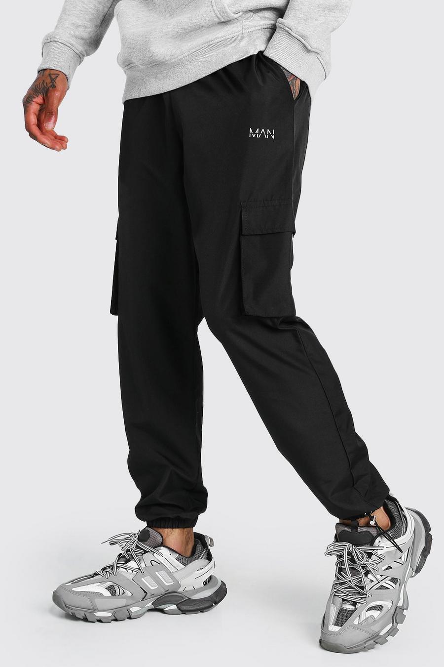 שחור מכנסי ריצה דגמ"ח עם כיתוב MAN ושרוך בקרסול image number 1