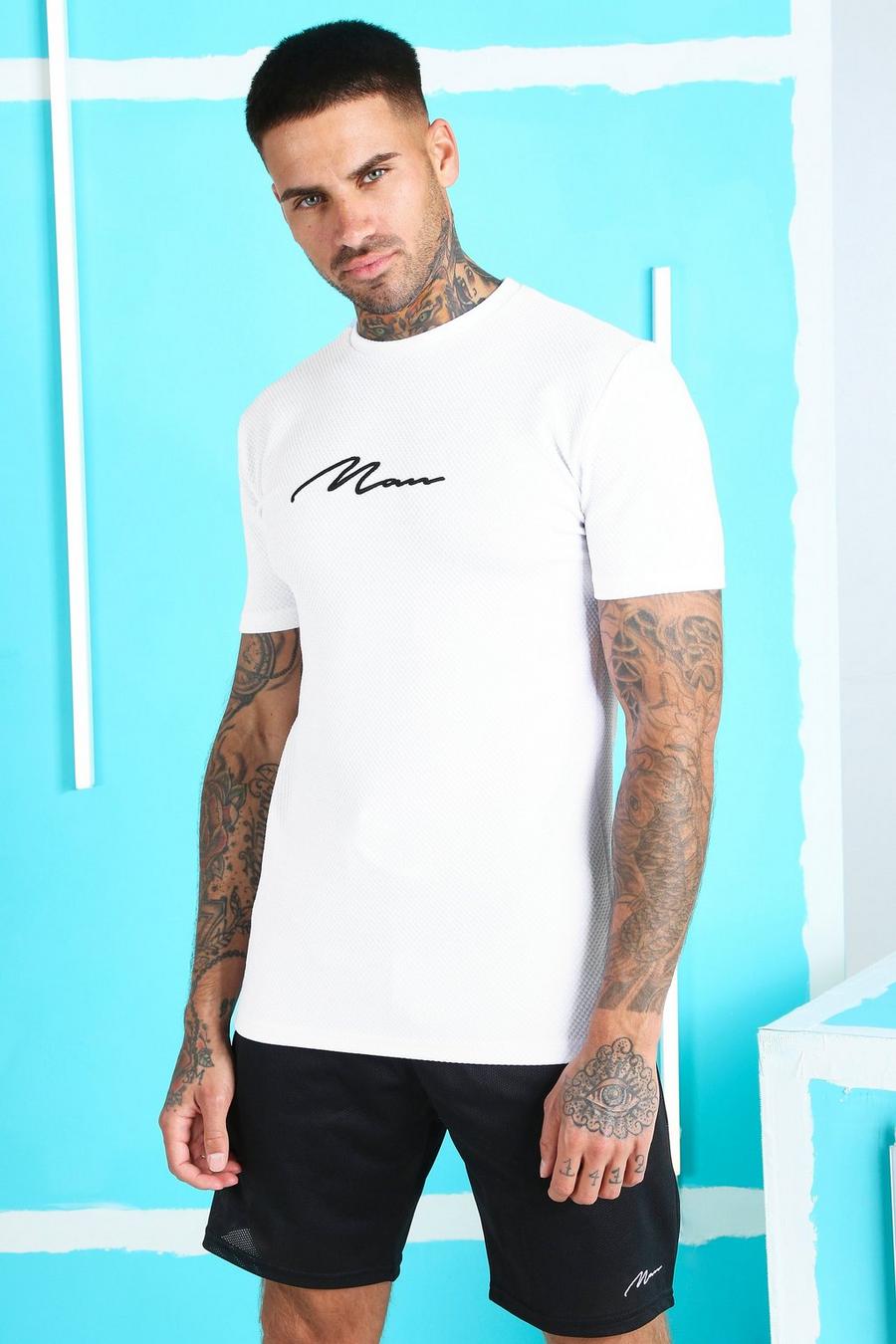 T-Shirt in Muscle-Fit mit MAN-Schriftzug und Waffelmuster, Weiß image number 1