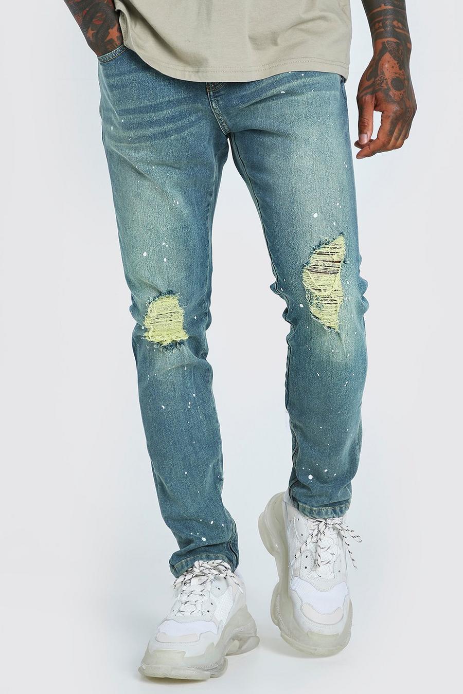 Antique blue Skinny jeans med slitna knän, färgstänk och dragkedja image number 1