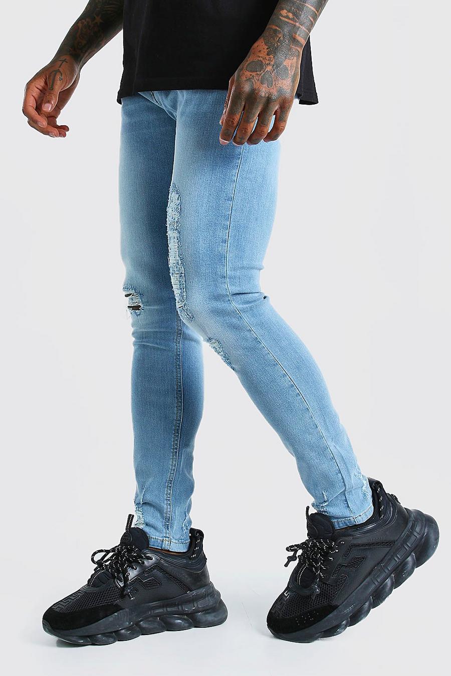 Light blue Super skinny jeans med mycket slitage image number 1