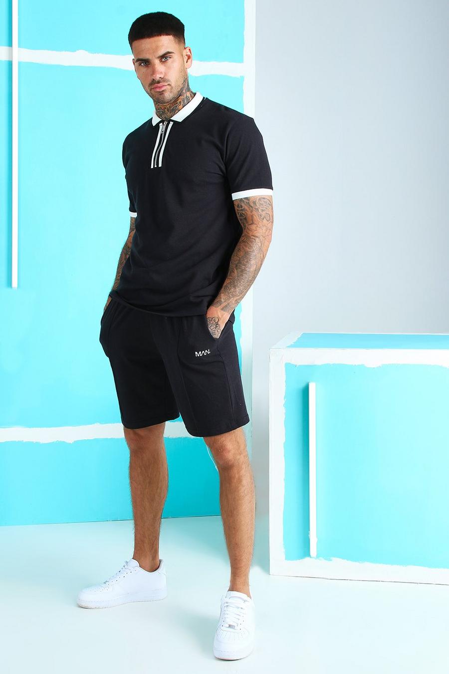 Set aus Piqué-Poloshirt mit Reißverschluss und Shorts mit MAN-Lasche, Schwarz image number 1