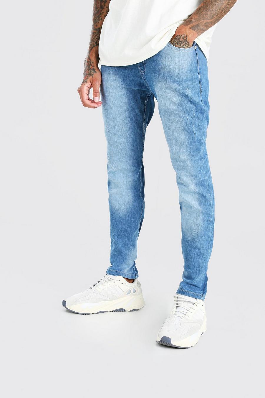 כחול ביניים סקיני ג'ינס עם קרעים קלים image number 1