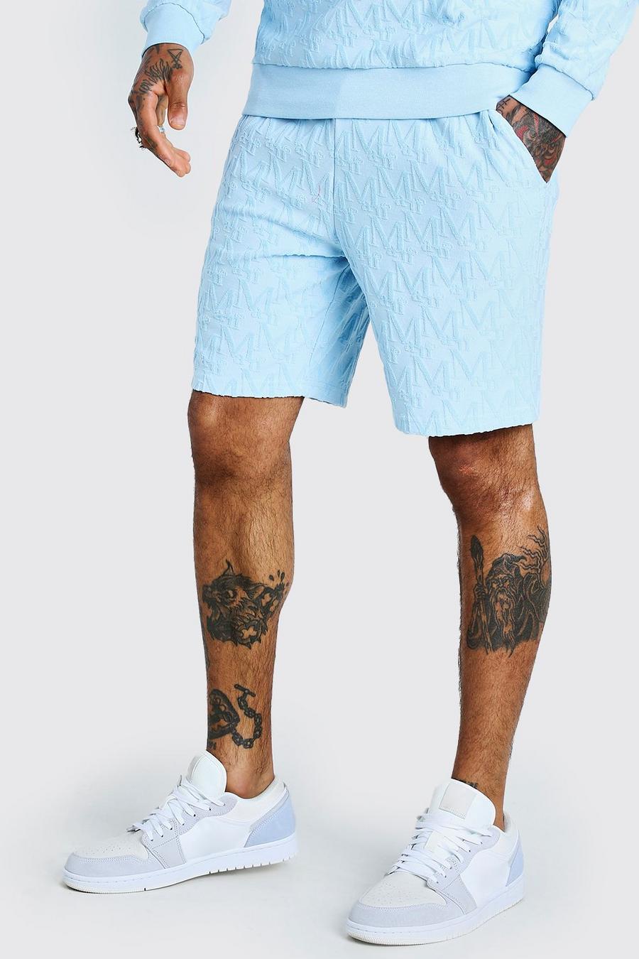 Pantalones cortos de largo medio con manograma de velvetón, Polvos azul image number 1