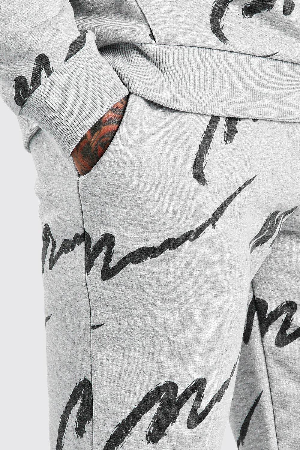 all over man printed hooded tracksuit grey