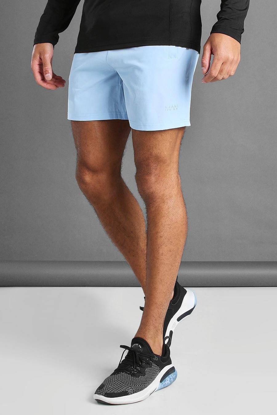 Blue MAN Active Shorts With MAN Waistband Detail image number 1