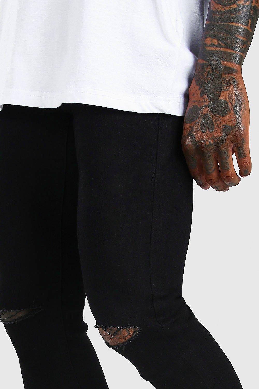 black skinny jeans with slits in knees
