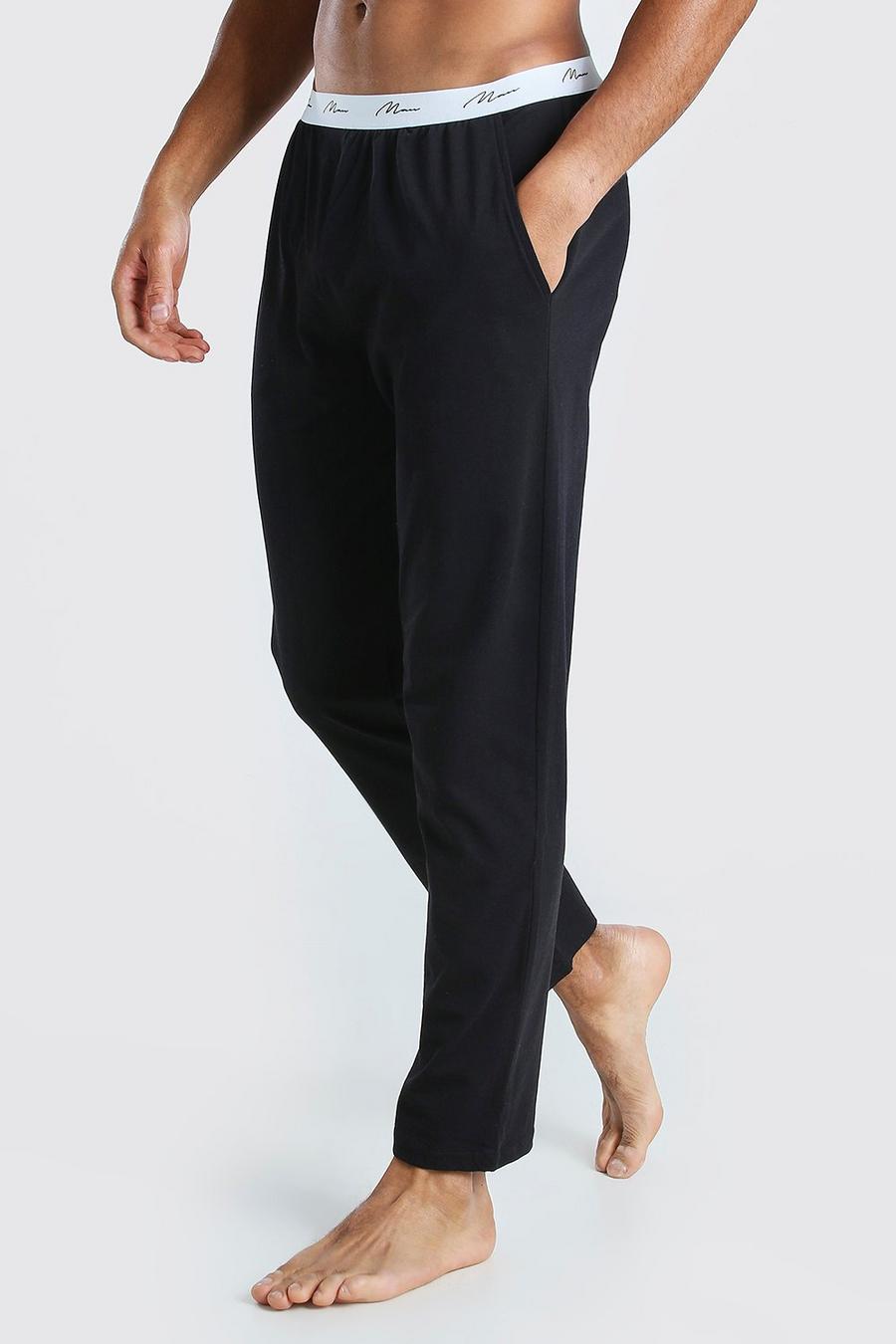 Pantalones cómodos con cintura bordada MAN Signature, Negro image number 1