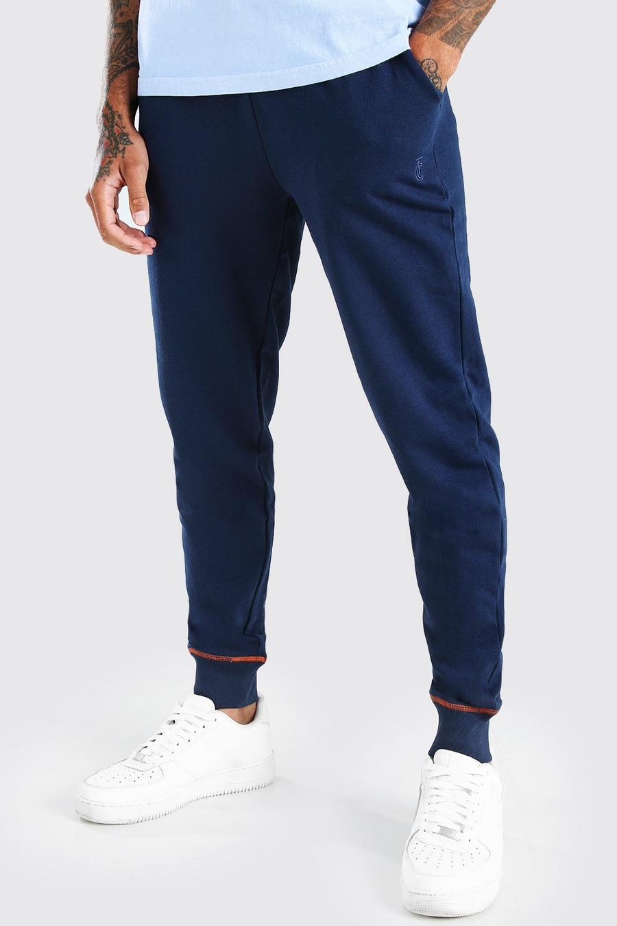 Pantalones de correr Slim Fit con costuras en contraste image number 1