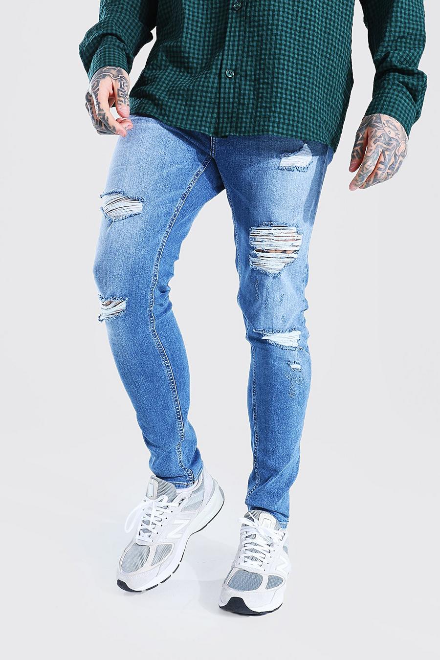 כחול ביניים סקיני ג'ינס מבד נמתח עם קרעים מרובים image number 1
