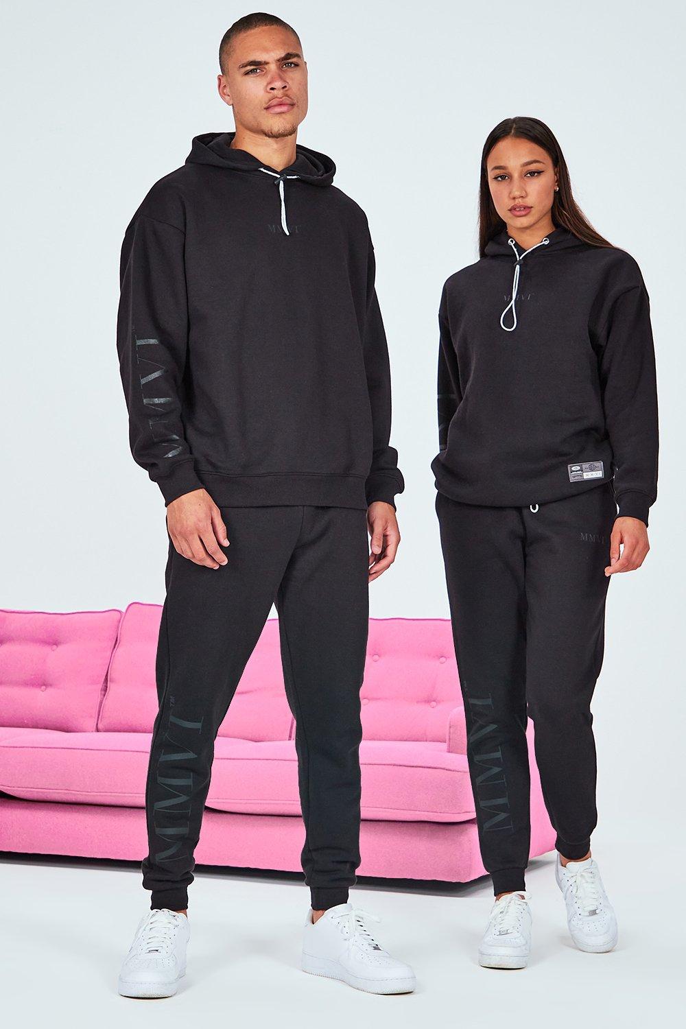 men and women matching tracksuits